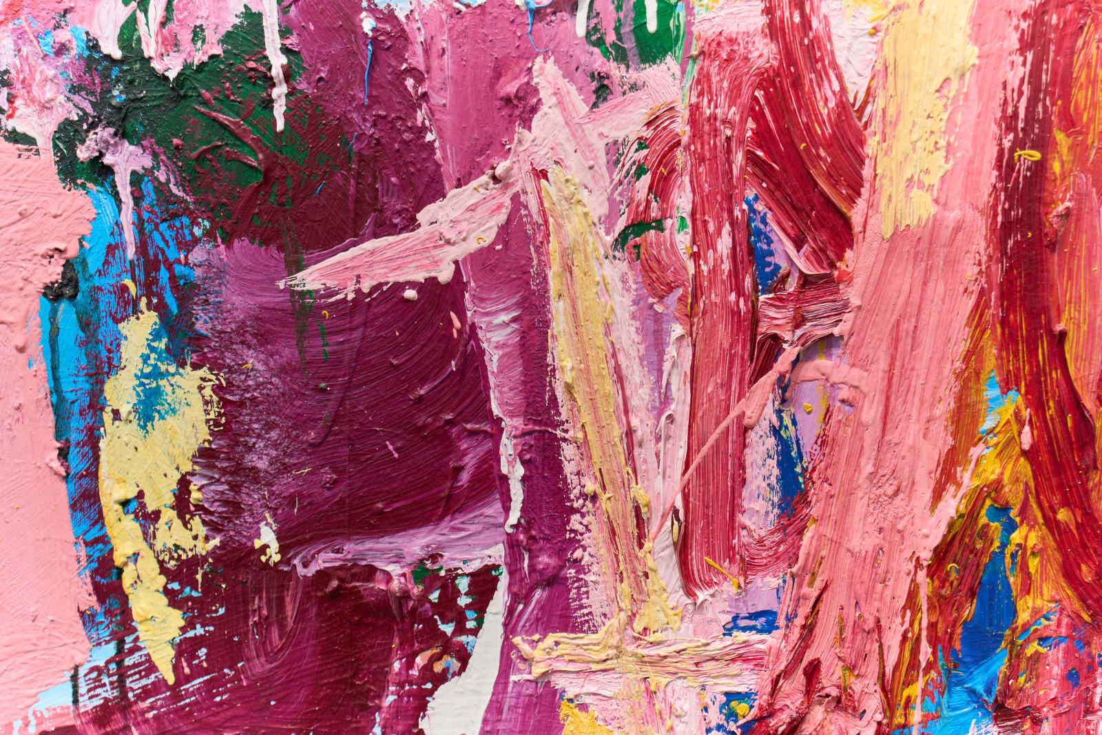 Close detail of a thickly textured abstract painting in magenta, pink, yellow, and green