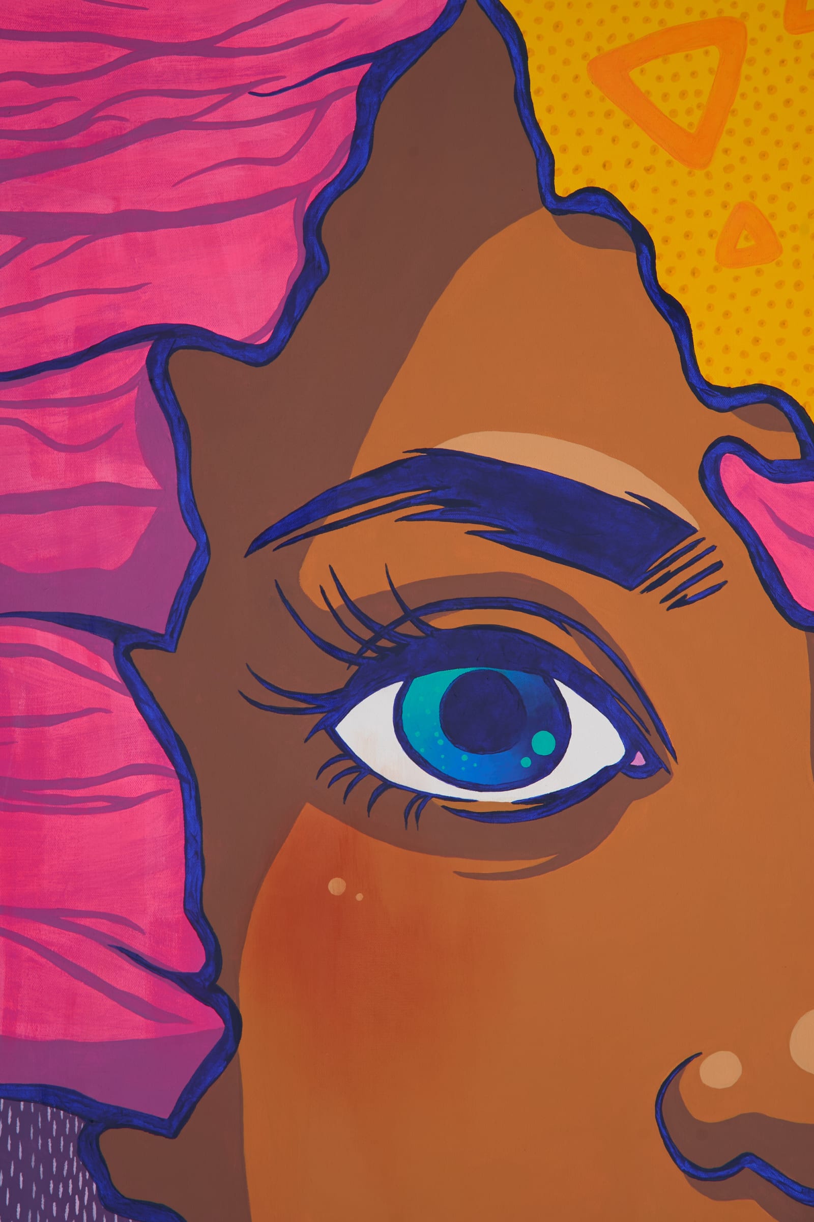 Extreme close-up detail of a pop-art painting showing one large blue eye and eyebrow on a patterned face, the kind of tight, color-accurate crop a documentation file provides
