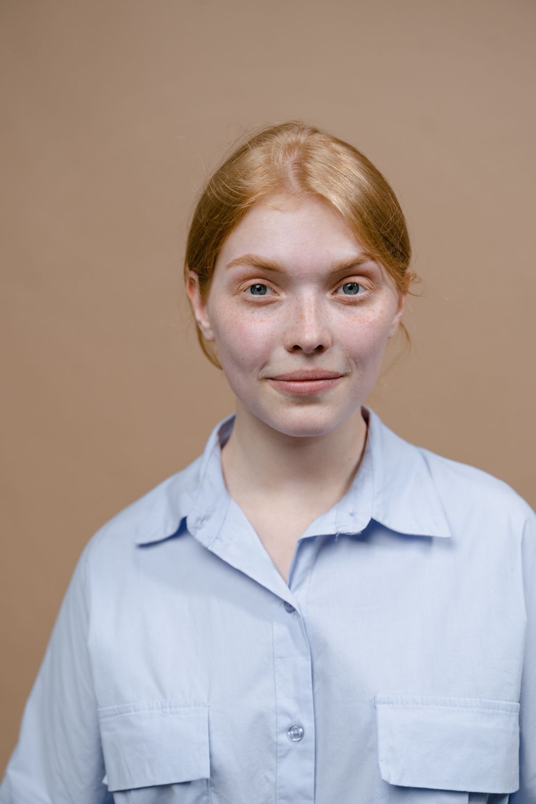 Portrait of a person against a plain neutral background, a generic example of a simple headshot-style crop.